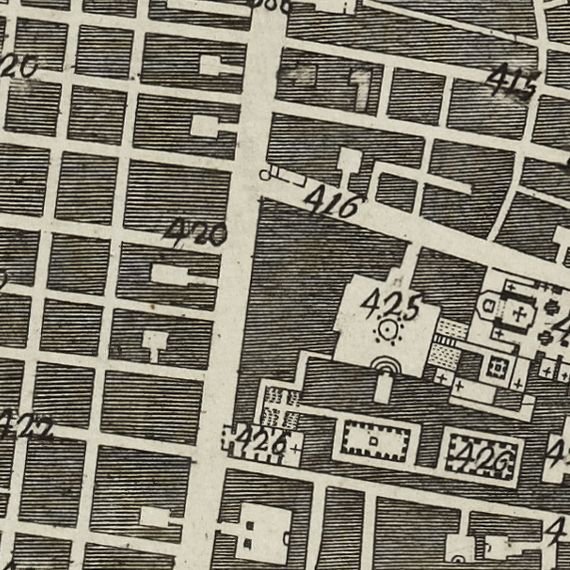 Historic map with numbered blocks and streets.
