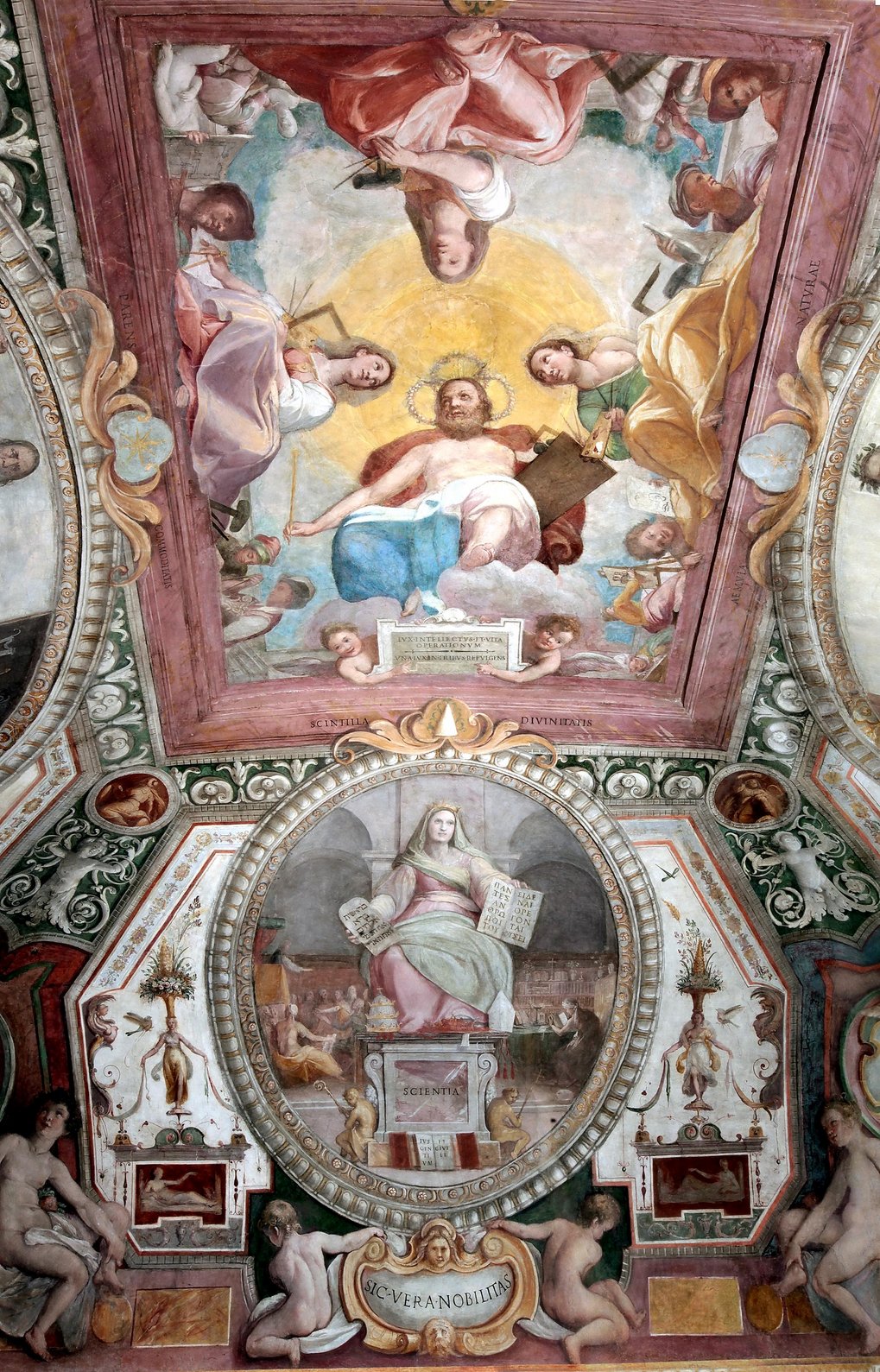 Ceiling fresco with vibrant colors and allegorical figures in classical poses.