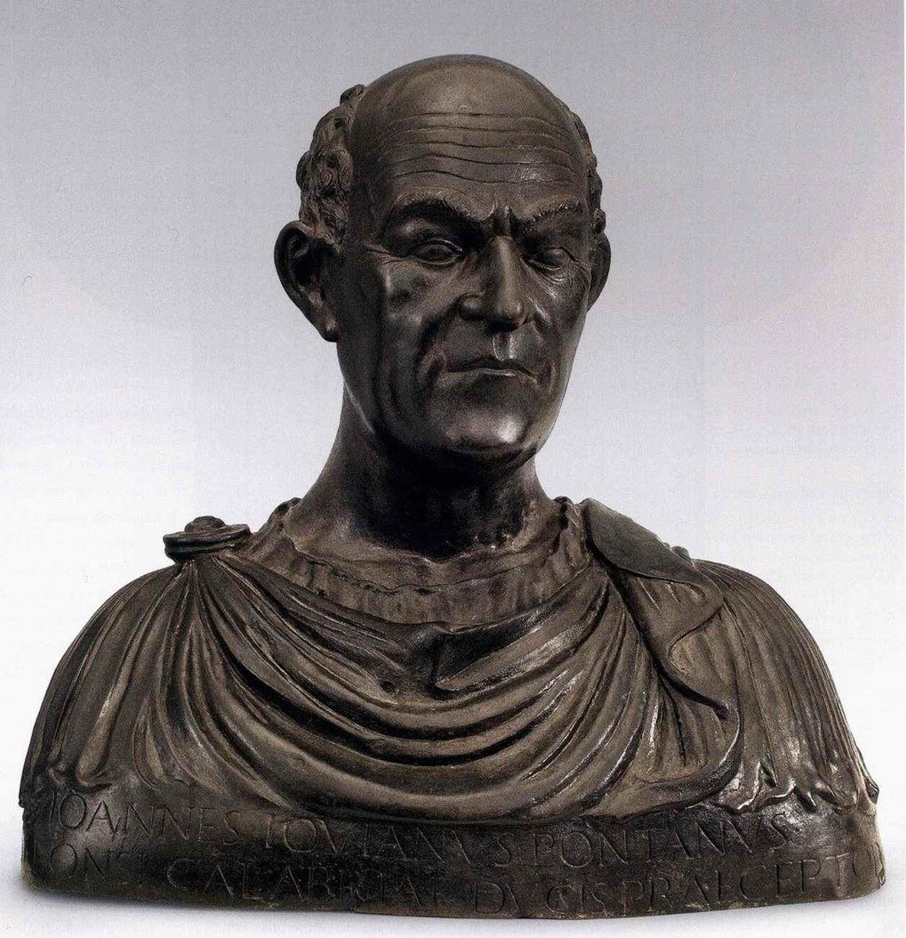 Bronze bust with Roman-style drapery and engraved text.